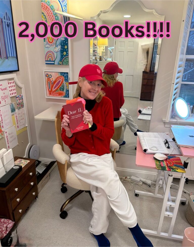 Amanda Haerstick holding her book Dear 1L